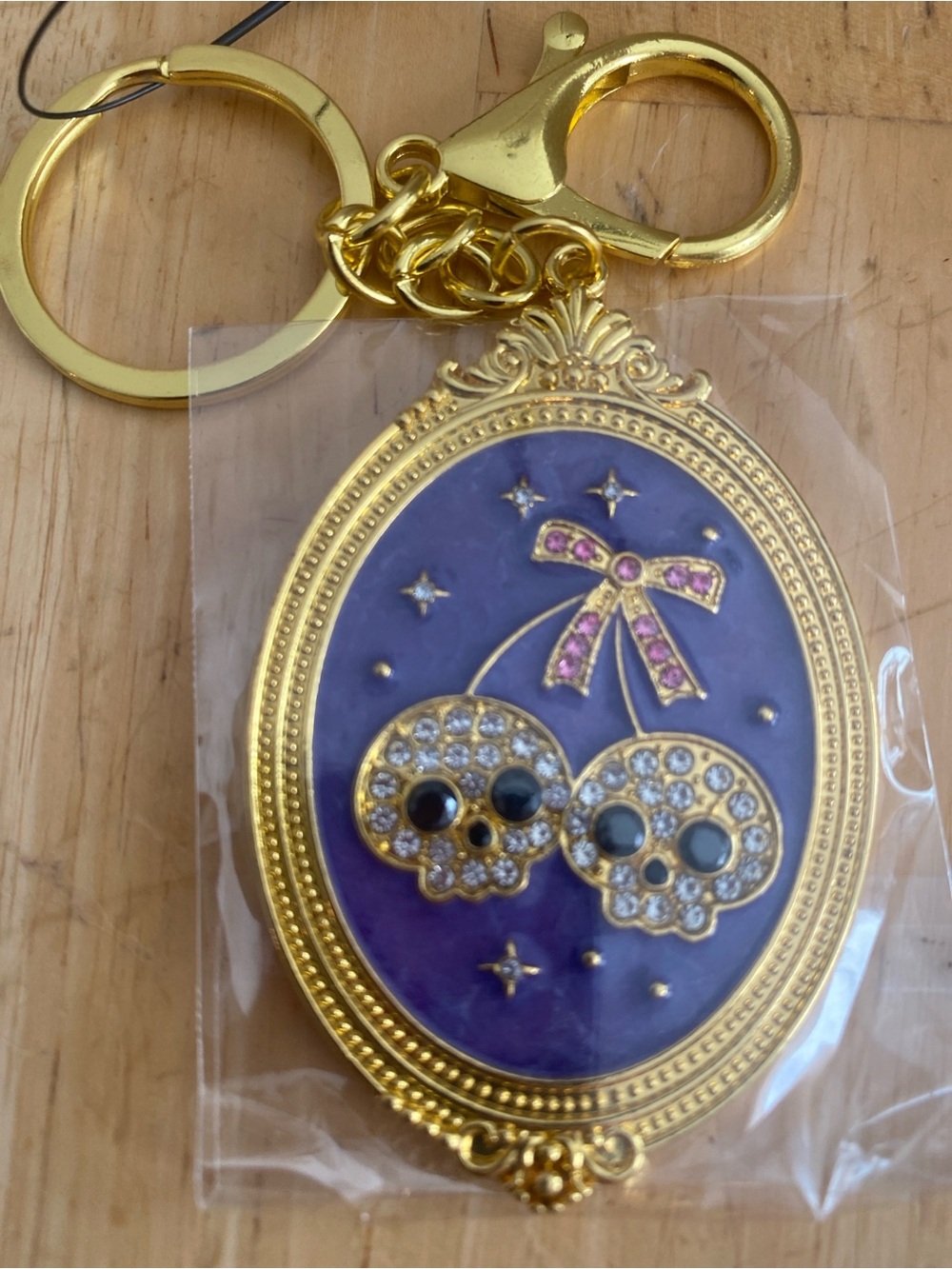Gold-Tone & Purple blingy Skull bagcharm & Keychain NWT Halloween or anytime